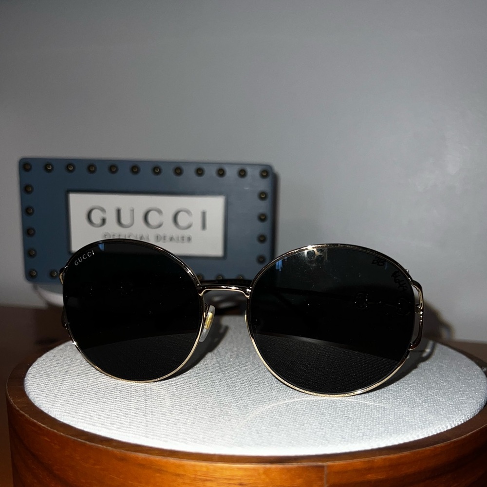 Gucci Black and Gold Round Sunglasses